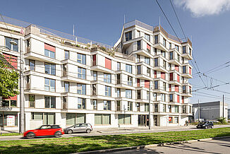 Building complex of the kupa quarter in Munich opposite the suburban railway line