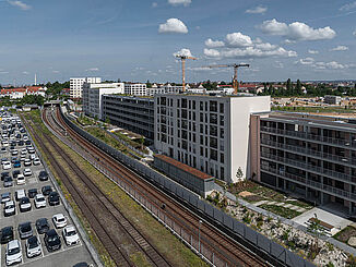 Quartiersentwicklung Lichtenreuth mit nachhaltiger Stadtplanung und Schwingungsisolierung zur Reduktion von Erschütterungen.